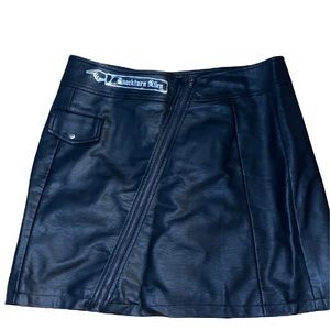 NWOT Harry Potter women’s miniskirt “Knockturn Alley” size 10, 100% polyester